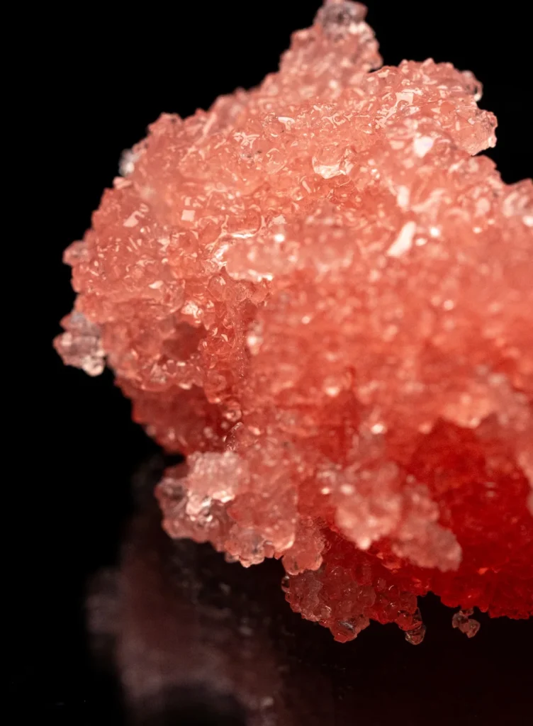 Close-up of RENORA sugar scrub crystals